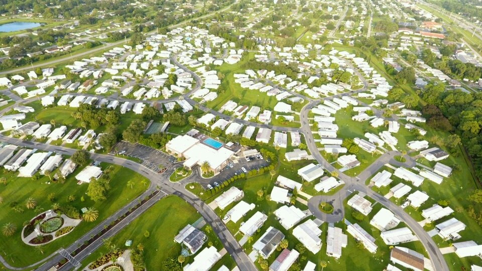 Aerial view of Holiday Park Phase I homes, clubhouse and pool in North Port