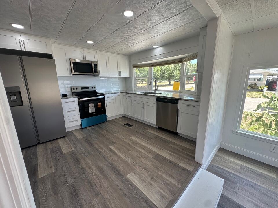 Completed mobile home kitchen and flooring